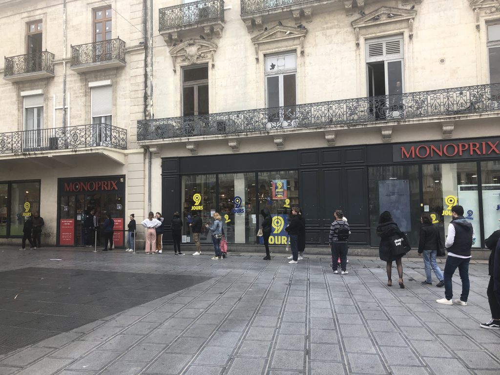 Shoppers line up outside Monoprix in Montpellier city center